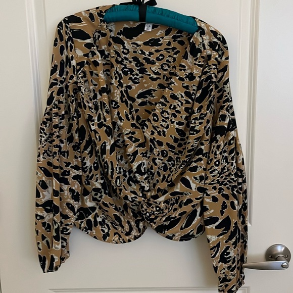 Small Women’s animal print blouse with the V-neck - Picture 1 of 4